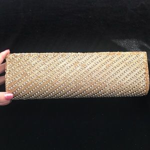 Gold and silver stone clutch